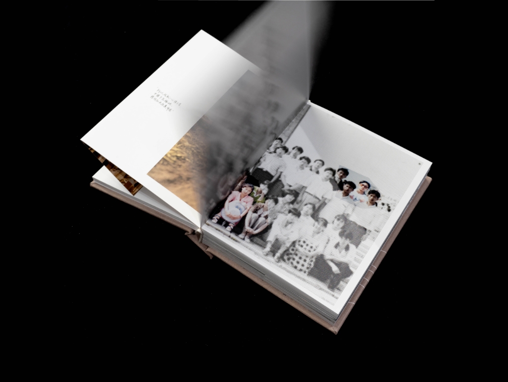 Artist book seen from the side on a black background
